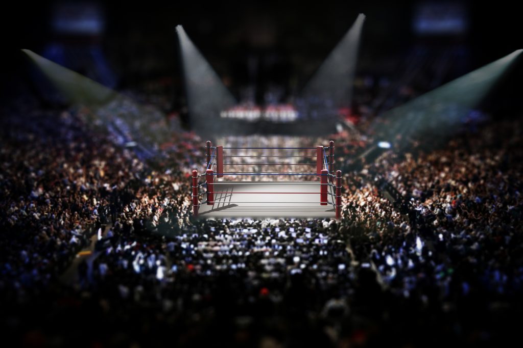 stock photo - empty wrestling ring with crowd | Jesus Calling